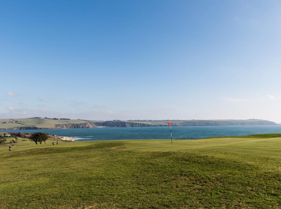 View of 12th green and out to sea at Carlyon Bay