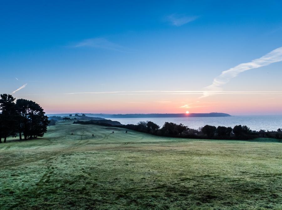 View of sunrise above gibon taken from Carlyon Bay golf course